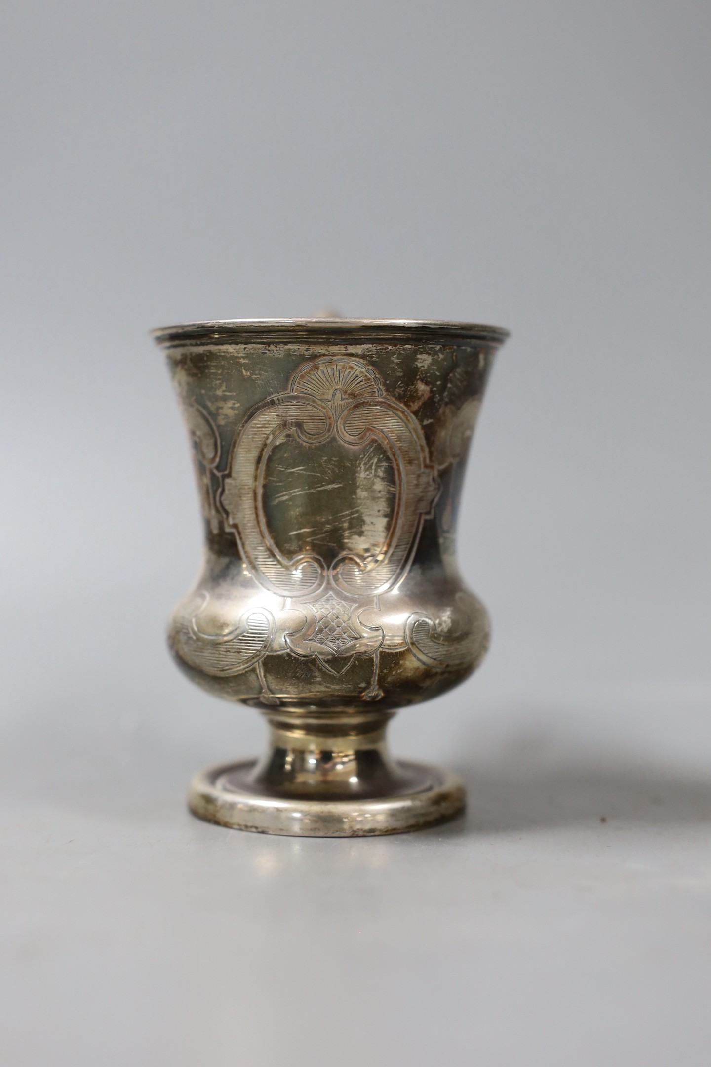 A Victorian urn shaped silver christening mug by Henry Wilkinson & Co, Sheffield, 1853, 10.5cm, 123 grams.